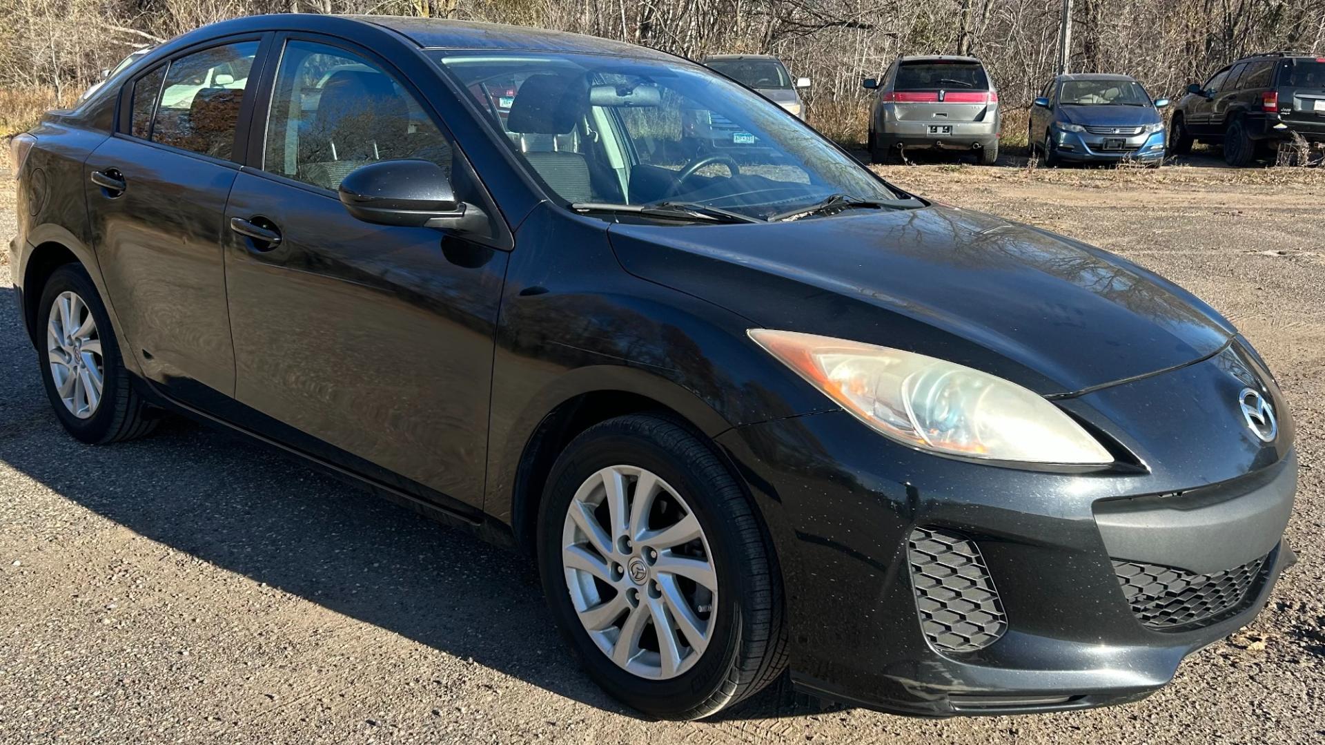 2012 Black /Black Mazda MAZDA3 (JM1BL1V70C1) , located at 17255 hwy 65 NE, Ham Lake, MN, 55304, 0.000000, 0.000000 - Photo#2